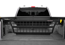 Load image into Gallery viewer, Roll-N-Lock 21-22 Ford F-150 (67.1in. Bed Length) Cargo Manager