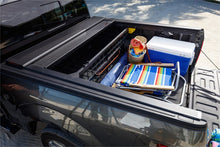 Load image into Gallery viewer, Roll-N-Lock 14-17 Chevy Silverado/Sierra 1500 68in E-Series Retractable Tonneau Cover