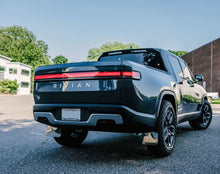 Load image into Gallery viewer, Rally Armor 22-24 Rivian R1T Black UR Mud Flap w/Tangerine Scream Logo