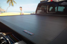 Load image into Gallery viewer, Roll-N-Lock 14-17 Chevy Silverado/Sierra 1500 68in E-Series Retractable Tonneau Cover